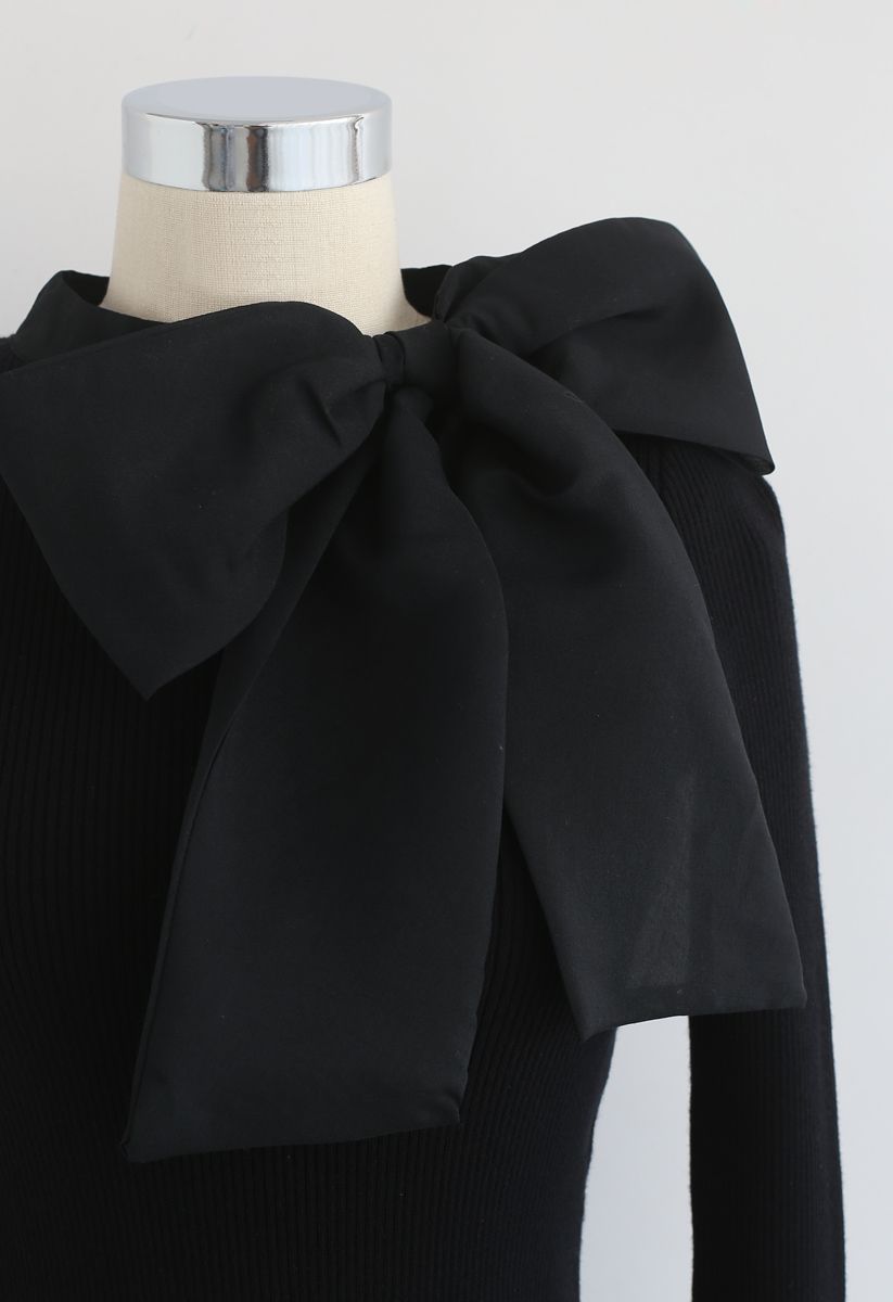 LEONA | BLACK KNIT TOP WITH BOW ACCENT